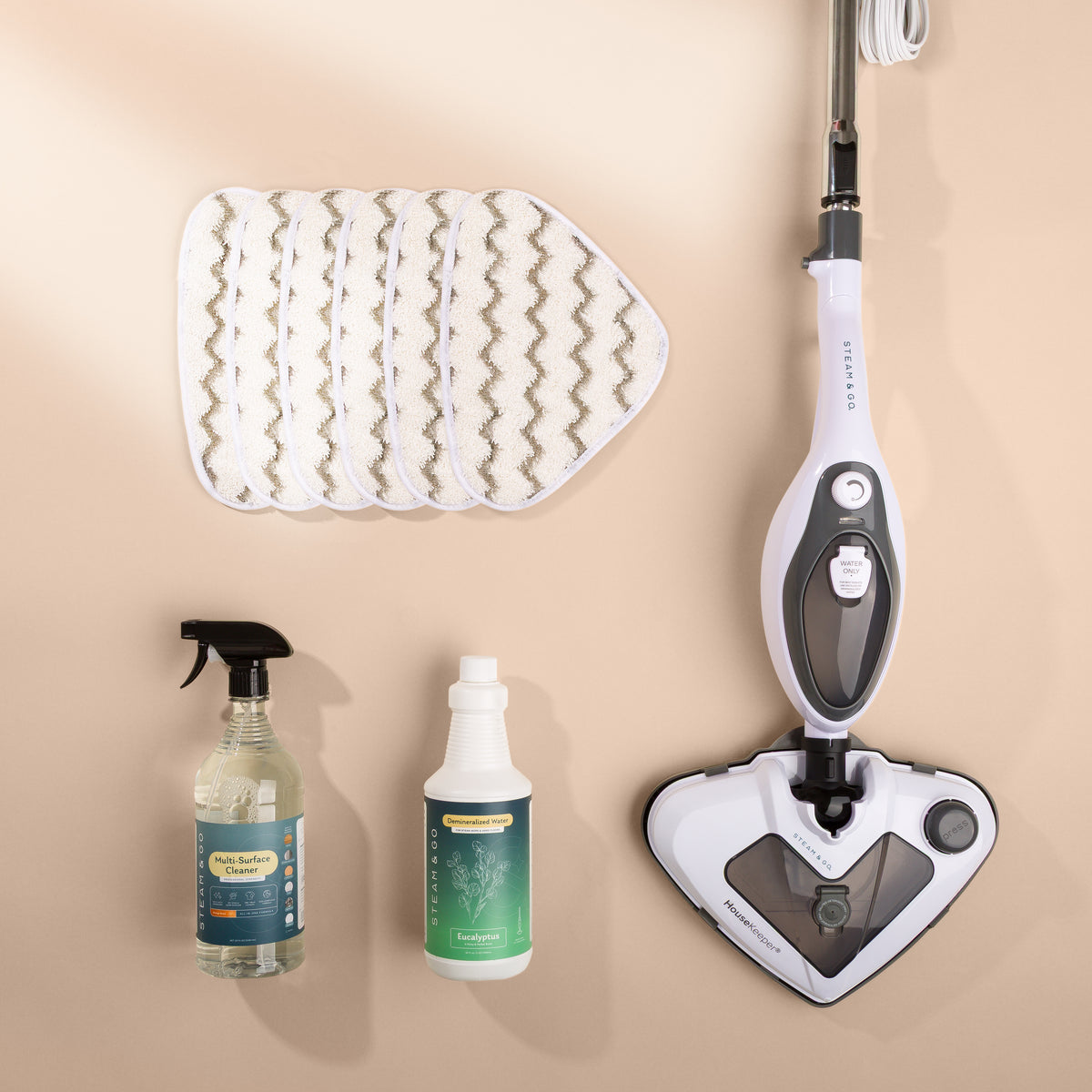 Steam Cleaning Complete System with The Housekeeper steam mop, 6 microfiber mop pads, multi-surface cleaner and eucalyptus demineralized steam water
