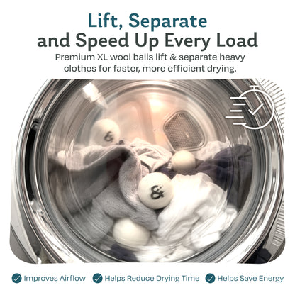 XL wool dryer balls tumbling with clothes in a dryer to improve airflow, reduce drying time and save energy